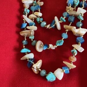 EP New York long necklace with beads and stones.